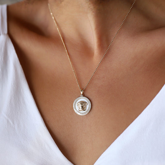 White Background Medusa Necklace